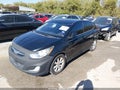 2012 Hyundai Accent — photo 2 of 10 | VIN KMHCU5AE6CU038091