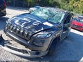 2015 Jeep Cherokee — photo 6 of 16 | VIN 1C4PJLDS2FW517640