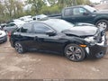 2017 Honda Civic — photo 13 of 16 | VIN 19XFC1F34HE016200