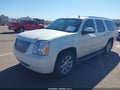2011 GMC Yukon XL — photo 2 of 16 | VIN 1GKS2MEF9BR184347
