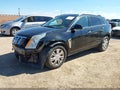 2016 Cadillac SRX — photo 2 of 17 | VIN 3GYFNBE34GS574849