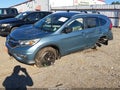 2015 Honda CR-V — photo 2 of 22 | VIN 2HKRM4H74FH620110