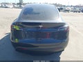2024 Tesla Model Y — photo 16 of 18 | VIN 7SAYGDED3RF156178