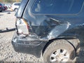 2003 GMC Envoy — photo 13 of 14 | VIN 1GKES16S936225957