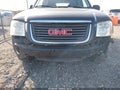 2003 GMC Envoy — photo 6 of 14 | VIN 1GKES16S936225957