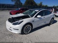 2022 Tesla Model 3 — photo 2 of 15 | VIN 5YJ3E1EA1NF370520