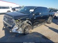 2014 Toyota Tundra — photo 2 of 17 | VIN 5TFDW5F1XEX382632