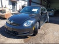 2016 Volkswagen Beetle — photo 2 of 17 | VIN 3VWJ17AT2GM616564