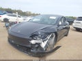2024 Tesla Model 3 — photo 2 of 17 | VIN 5YJ3E1EA1RF831432