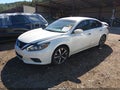 2017 Nissan Altima — photo 2 of 17 | VIN 1N4AL3AP3HC125924