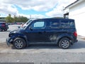 2008 Honda Element — photo 14 of 16 | VIN 5J6YH28718L018150