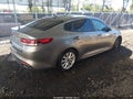 2018 Kia Optima — photo 4 of 14 | VIN 5XXGT4L33JG261271