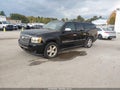 2009 Chevrolet Suburban 1500 — photo 2 of 16 | VIN 1GNFK36389R216122