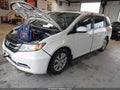 2014 Honda Odyssey — photo 2 of 15 | VIN 5FNRL5H69EB120649