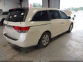 2014 Honda Odyssey — photo 4 of 15 | VIN 5FNRL5H69EB120649