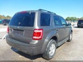 2009 Ford Escape — photo 4 of 11 | VIN 1FMCU03799KA88280