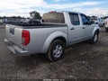2011 Nissan Frontier — photo 4 of 16 | VIN 1N6AD0ER7BC409904