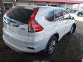2015 Honda CR-V — photo 4 of 15 | VIN 5J6RM4H59FL086123