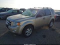 2011 Ford Escape — photo 2 of 17 | VIN 1FMCU9DG6BKA98094