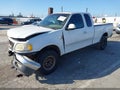 2002 Ford F-150 — photo 2 of 16 | VIN 1FTRX18L72NB48742