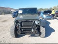 2016 Jeep Wrangler Unlimited — photo 12 of 16 | VIN 1C4BJWDG2GL115448