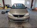 2004 Honda Civic — photo 11 of 15 | VIN 1HGEM22564L009175