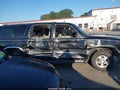 2001 Chevrolet Suburban 1500 — photo 13 of 16 | VIN 3GNFK16T71G161199