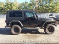 2004 Jeep Wrangler Unlimited — photo 13 of 16 | VIN 1J4FA49S74P761148
