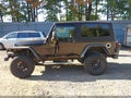 2004 Jeep Wrangler Unlimited — photo 14 of 16 | VIN 1J4FA49S74P761148