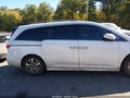 2014 Honda Odyssey — photo 13 of 16 | VIN 5FNRL5H98EB032668