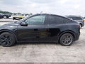 2025 Tesla Model Y — photo 13 of 18 | VIN 7SAYGDED3SF215199