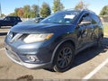 2015 Nissan Rogue — photo 2 of 15 | VIN 5N1AT2MT5FC852665