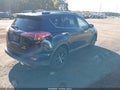 2018 Toyota RAV4 Hybrid — photo 4 of 16 | VIN JTMJJREV3JD233939