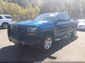 2017 Chevrolet Silverado 1500 — photo 2 of 16 | VIN 3GCUKREC1HG136387