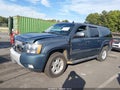 2009 Chevrolet Suburban 1500 — photo 2 of 16 | VIN 1GNFK26319R293621