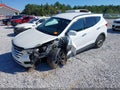 2013 Hyundai Santa Fe — photo 2 of 11 | VIN 5XYZU3LB3DG064379