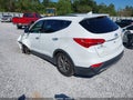 2013 Hyundai Santa Fe — photo 3 of 11 | VIN 5XYZU3LB3DG064379