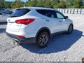 2013 Hyundai Santa Fe — photo 4 of 11 | VIN 5XYZU3LB3DG064379