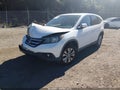 2013 Honda CR-V — photo 2 of 16 | VIN 5J6RM4H5XDL036635