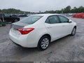 2014 Toyota Corolla — photo 4 of 19 | VIN 5YFBURHE2EP127525