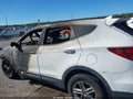 2018 Hyundai Santa Fe — photo 14 of 14 | VIN 5NMZUDLB0JH073502