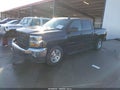 2018 Chevrolet Silverado 1500 — photo 2 of 18 | VIN 3GCUKREC1JG612028