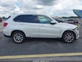 2014 BMW X5 — photo 13 of 16 | VIN 5UXKR2C56E0C01007