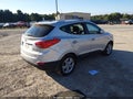 2011 Hyundai Tucson — photo 4 of 16 | VIN KM8JUCAC8BU309208