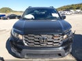 2022 Honda Passport — photo 12 of 16 | VIN 5FNYF8H64NB0