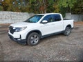 2026 Honda Ridgeline — photo 2 of 16 | VIN 5FPYK3F5XTB005530