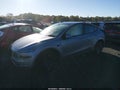 2026 Tesla Model Y — photo 2 of 15 | VIN 7SAYGDED0TF425504