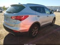 2014 Hyundai Santa Fe — photo 4 of 12 | VIN 5XYZUDLB5EG166466