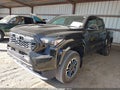 2025 Toyota Tacoma — photo 2 of 16 | VIN 3TMLB5JN8SM155622
