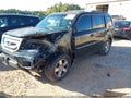 2010 Honda Pilot — photo 2 of 16 | VIN 5FNYF3H54AB020144